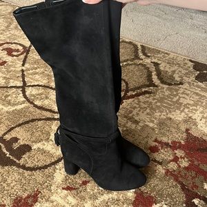 Long black boots with heel